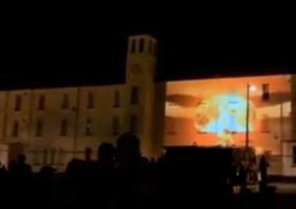 A projection of a nuclear mushroom cloud against the Ebrington clock tower - now home to the Turner Prize - during Haris Pasovics The Conquest of Happiness in Londonderry in September. A thinly-veiled cold war has exploded between elements within the Culture Company and Derry City Council.