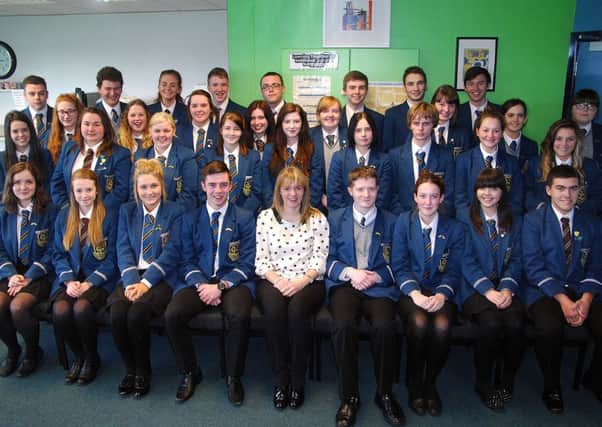 Slemish College Head of 6th form Mrs Mitchell joins the new prefect students for 2013/14. INBT 44-822H