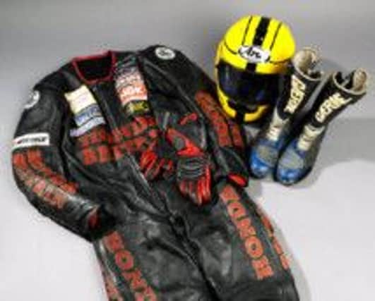 Joey's leathers, boots and helmet which are up for auction.