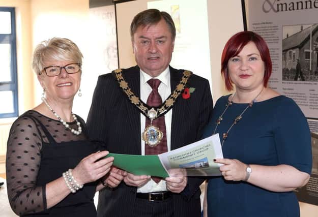 Pictured at the Rathcoole Churches Community Group AGM in the Dunanney Centre are Pat Hutchinson MBE (chairman), Mayor Fraser Agnew and Vicky Moore (centre manager). INNT 44-062-FP