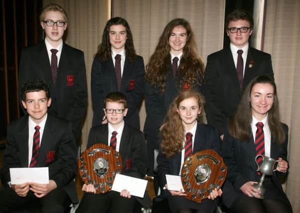 Ballymena Academy form prize winners. Included are Beth Herbison, Crawford Fairfield, Katie Lawther, Robert Adair, Emily Shaw, David McNeill, Sarah McClean and Michael Knowles. INBT44-221AC