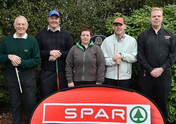 Photographed last week were Sean, Anne Marie and Eamon McKillop, of the Spar, Frys Road with golfers Cormick McQuillan and John Burns who played in the Spar Frys Road Golf Tournament at Ballymena Golf Club. INBT 44-820H