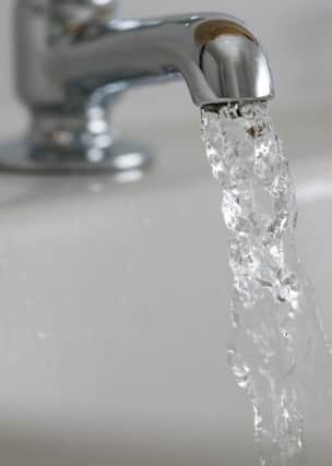 Water flows from a domestic tap, United Kingdom
