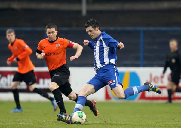 Coleraine's Eoin Bradley slides a perfect pass through to team mate Gareth Tommons for the only goal of the opening halfagainst Glenavon on Saturday. Picture Presseye.