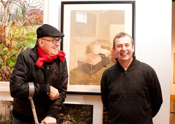 William Clark owner of Cafe Conor with Eddie Rafferty and his painting 'Russell' winner of the RUA Conor Prize for a figurative work in any media, sponsored by Conor Cafe. Picture Elaine Hill