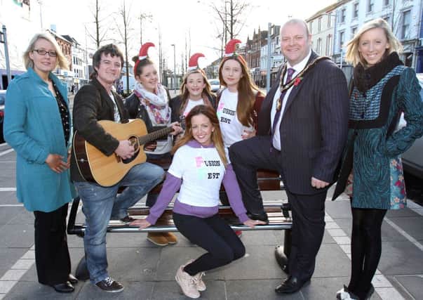 All set for the big Christmas Lights Switch On in Lurgan on November 15th are (from left) Lyn McNeill, Town Centre Manager; Cllr Mark Baxter, Mayor of Craigavon and Cllr Carla Lockhart, Chair of the Development Committee with, Marty T and Louise Fahey, Director, Chloe Fox, Kathryn McCorry and Erin McCormac from  Little Starz Academy. RicPics. 4/11/13