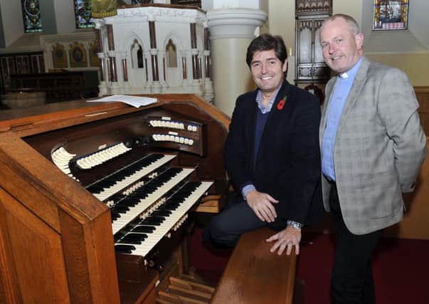 Rev Geoff Wilson, rector of Shankill Parish Church and Mr Carl McCambley, organist. INLM45-102gc