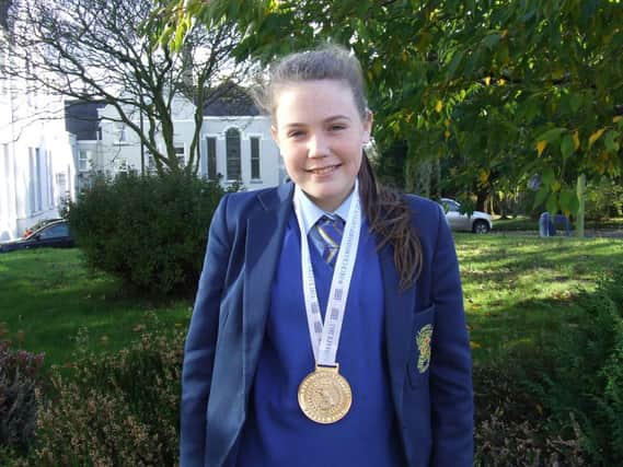 Chloe Hope, a Year 9 student from Loreto College, who won a Gold Medal at the WKU Kickboxing World Championships recently.