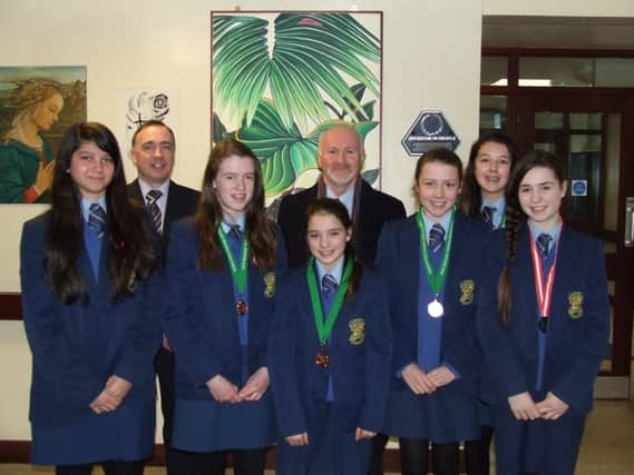 Loreto College Cross Country Bronze Medallists at All Ireland level, 2012-13 with coach Mr P Cunning