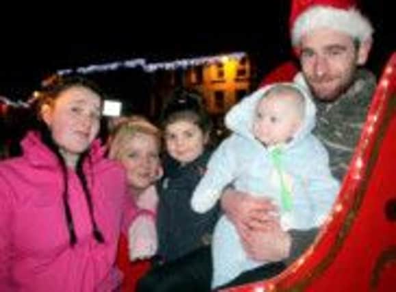 Families pictured at a previous Ballycastle Christmas lights switch-on. INBM46-13