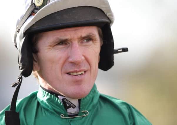 AP McCoy at Friday's Down Royal Festival of Racing. McCoy, who has been champion jockey in every season since he turned professional in 1995-96, was riding at the track for the first time in five years. He steered the 2-9 favourite Jezki to a three-and-a-quarter-length victory in the WKD Hurdle, moved him to eight victories away from the milestone of 4,000 winners. Picture: Cliff Donaldson