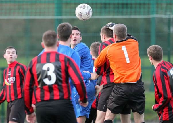 Up in the air - action from Castle Star v Tobermore Utd. INLT 46-424-RM