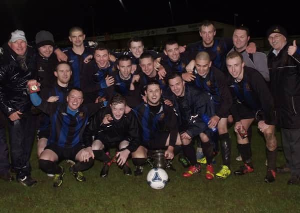 The BBOB team celebrate after lifting the Summer Cup at The Riverside Stadium on Friday night. INLS4613-158KM
