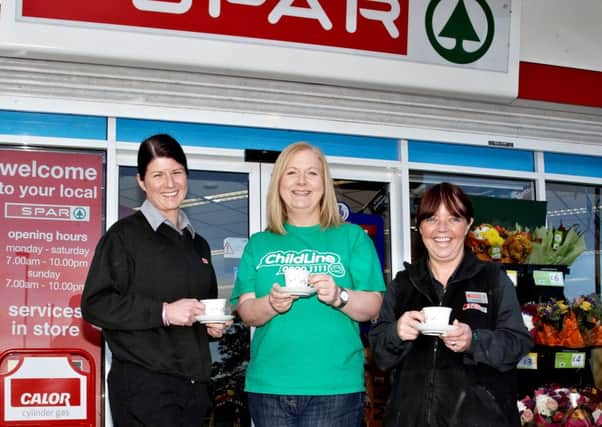 L-R SPAR Culbertsons manager, Lisa Martin, NSPCC corporate fundraising Executive Marie McGuckin and SPAR's Rhonda Foster.
