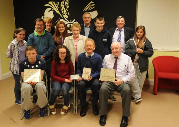 Group pictured at the presentation of a cheque Cormac Wilson, St Vincent De Paul, the proceeds of the sale of the Book and dVD of the recordings of Willie Gerard Melarkey. Included, are, Catherine Coyle, Ryan Gillespie, John Doherty, Roisin Coyle, Sean Coyle, Harley, McKittrick, Edel Mcallister, Phyllis Gormley, Calvin Boyd, Councillor Gus Hastings, Ryan Gillespie and Nadia Bradley.
DER4213SL200