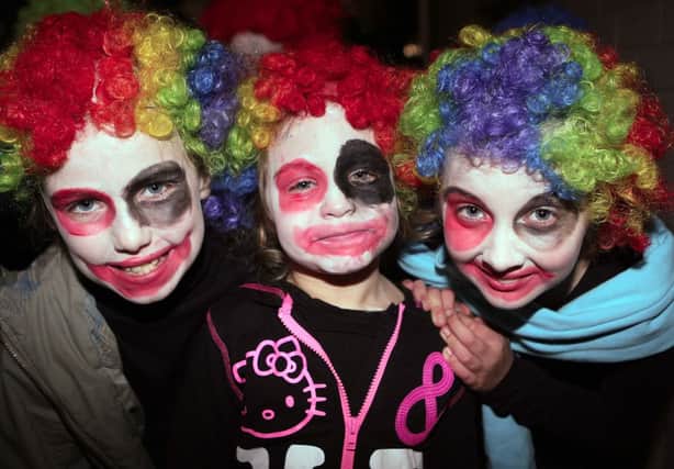 Jade Louise Butler, Mackenzie Graham and Nickola Sobiecka clowning around for Halloween. INNT 45-047-FP
