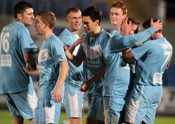 Ballymena's  Mark Surgenor (centre) is congratulated after scoring in his side's 4-0 League Cup quarter-final win over Portadown. Picture: Press Eye.