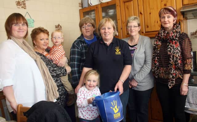Sandra Henderson (third right) with helpers at a fund-raising day for the Boom Foundation at her home on the Farren Road, Ballymoney.INBM47-13 100F