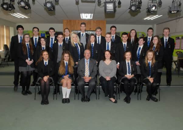 Year 13 and 14 subject mentors at Banbridge High School along with Mr Andrew Bell, principal, with Mrs Siobhan Haines, head of 6th form. INBL4513-BBHS2