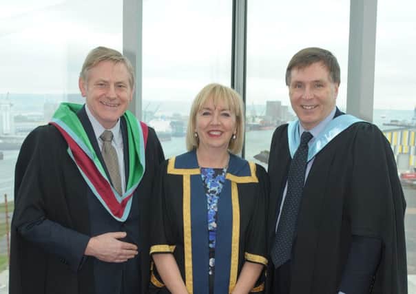 Belfast Metropolitan College conferred its inaugural Honorary Fellowship award to Alan Clarke, Chief Executive of Northern Ireland Tourist Board, during its annual Graduation event which celebrated the achievements of over 1,000 higher education students. Alan, who was recognised for his outstanding contribution to the local tourism economy, is pictured with Marie-Therese McGivern, Principal and Chief Executive of Belfast Met, and Richard Oâ¬"Rawe, Chair of Belfast Metâ¬"s Governing Body.