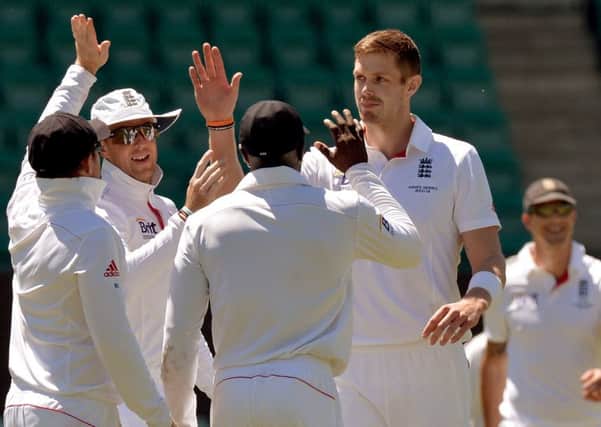 Englands Boyd Rankin (second right) celebrates with Paul Carberry, Ian Bell and Craig Swann after taking a wicket against the Australia Invitational XI.