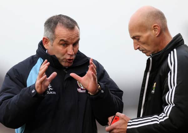 Ballymena manager Glenn Ferguson remonstrates with fourth official Colin Burns after Ards goalkeeper Graeme McKibbin escapes a red card after catching the ball outside the penalty area. Picture: Press Eye.