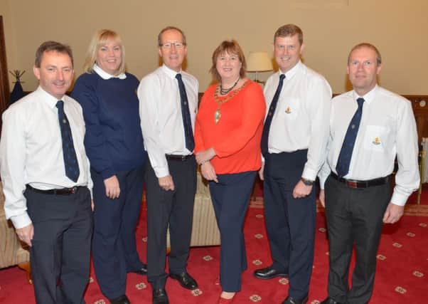 Members of the East Antrim Battalion of the Boys' Brigade pictured in the Larne Mayor's Parlour with Larne Mayor Maureen Morrow to mark the 125th anniversary of the Boys' Brigade in Northern Ireland. Pictured are Training Officer John Cathcart, Margaret McAdoo, Battalion President Drew Buchanan MBE, Colin Bell and David Hoy. INLT 47-347-PR