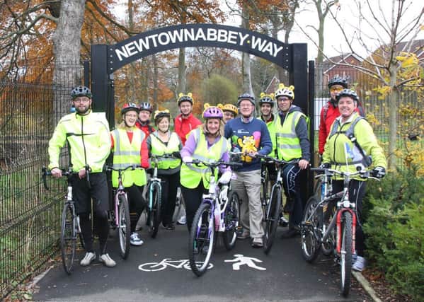 The cyclists prepare to set off from Mossley Mill along the Newtownabbey Way en route to Titanic Belfast. INNT 47-508CON