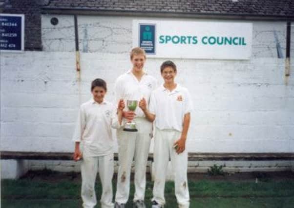 Boyd (centre) pictured with his younger brothers David and Robert (Junior) with the U14 Cup. INLS47-Rankin 2