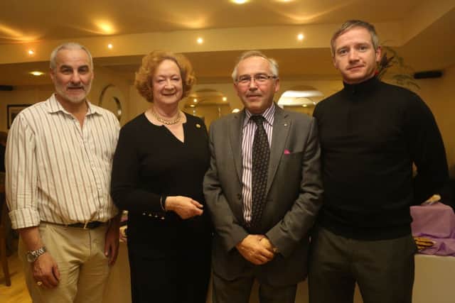 President of the Rotary Club of Coleraine with Rotarian Trevor Kane, Bayview Hotel, Marc Fairley, Fairley's House of Wine, and Rotarian John Esler, at last week's charity wine tasting event in the Bayview Hotel, Portballintrae.