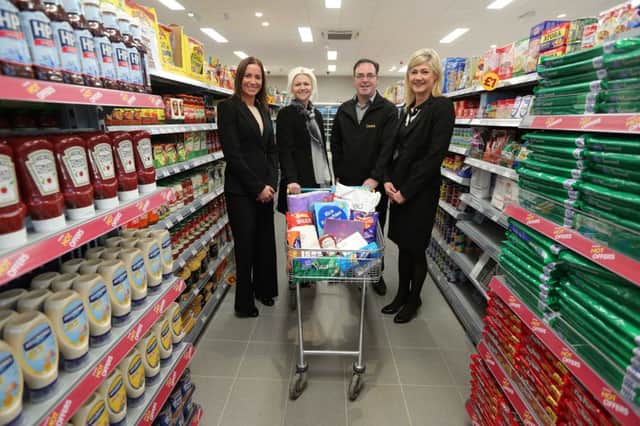 Dympna and Robert Millen of Red Grocery with, left, Keira Davidson, business executive at Ulster Bank, and right, Roisin McAlister, business manager at the bank. INCT 48-702-CON RED