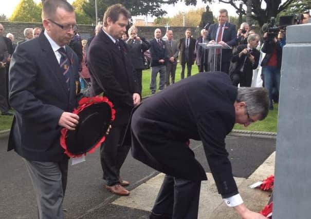 Lexi Davidson, spokesperson for Lurgan PUP and Tom Elliot UUP MLA laying wreaths at the Commonwealth War Graves Memorial, Glasnevin Cemetery, Dublin