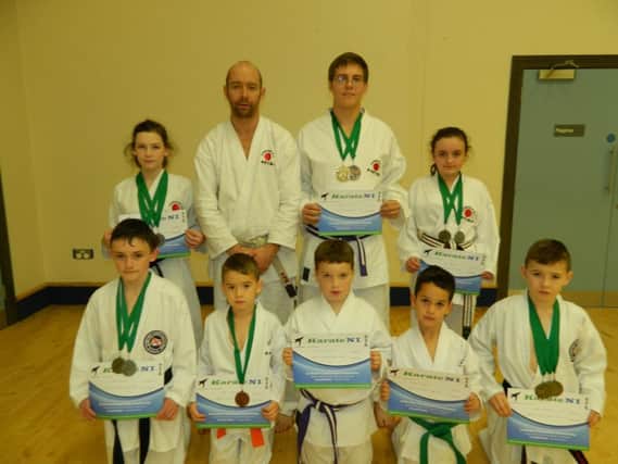 Pictured here are members of the Zanshin Shotokan Karate Club who recently competed in the first Karate Northern Ireland Championships.