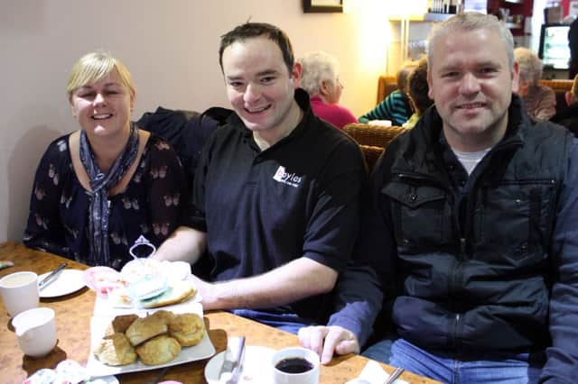 Councillors Margaret Anne McKillop and Paudie McShane with Aiden Boyle at the coffee morning in Boyles Care for Cancer Research.INBM48-13 Pic by Daniel McAfee.