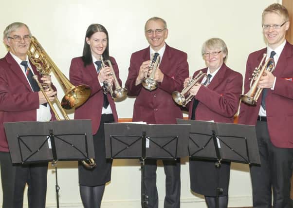 First Larne Old Boys Silver Band Committee pictured with the instruments purchased with the assistance of Arts Council NI funding. INLT 48-603-CON