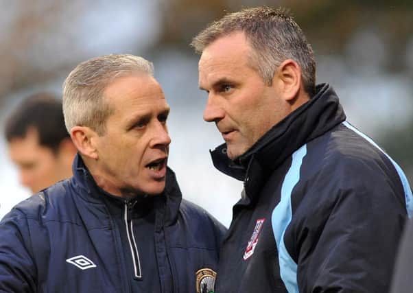 Warrenpoint assistant manager, Harry Fay and Ballymena manager Glenn Ferguson discuss the red card incident 
during Saturday's match at Stangmore Park. Picture: Press Eye.