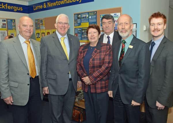 Alliance Party leader,David Ford MLA (2nd right) is pictured with party members (from left) Cllr Michael Lynch,Stewart Dickson MLA,Cllr Isobel Day,Cllr Noel Williams and Cllr Gavin Norris at the official reopening of the Carrickfergus Constituency Office in West Street. INCT 48-004-PSB