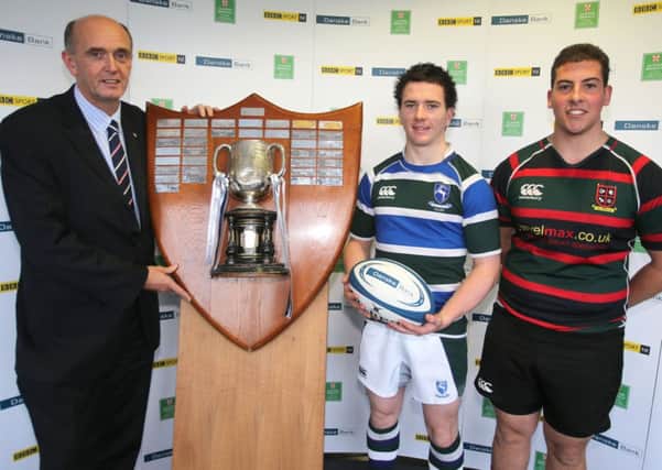 Cambridge House First XV captain Christopher Da Mata (right) pictured with Grosvenor Grammar captain Jamie McMullan and Ivan McMinn, Head of Corporate Banking at Danske Bank, at Monday's Schools' Cup draw. Picture: John Dickson.