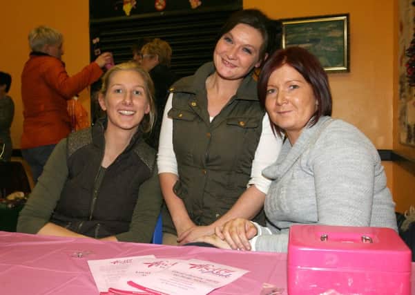 Tracey Redmond, Anne Gregg and Leanne Nevin, who organsied a Ladies Night in Clough Community Centre, raising money for Pretty in Pink. INBT48-256AC