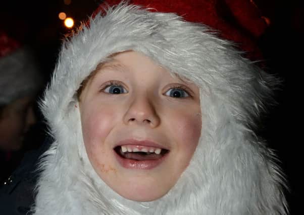 Dylan Morton (4) pictured at Ebrington Square when Santa switched on Derry's Christmas Lights. Picture Martin McKeown. Inpresspics.com. 22.11.13