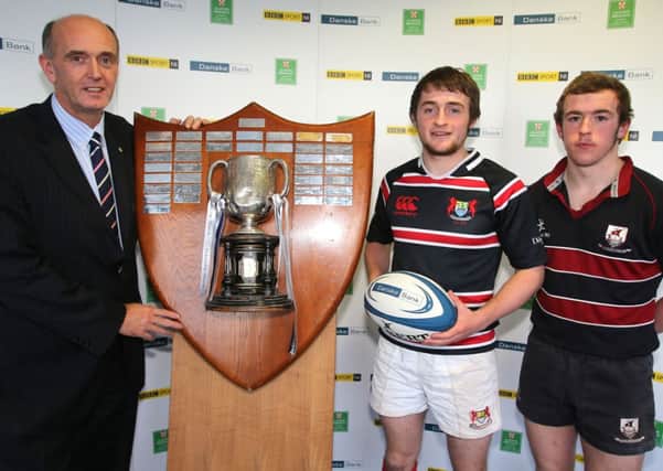 Pictured at the first round draw of the Danske Bank Schools Cup are (l-r) Ivan McMinn, Head of Corporate Banking at Danske Bank, Rory Thompson, Banbridge Academy captain, and Mark McAlister, his Larne Grammar School counterpart. Photo by John Dickson