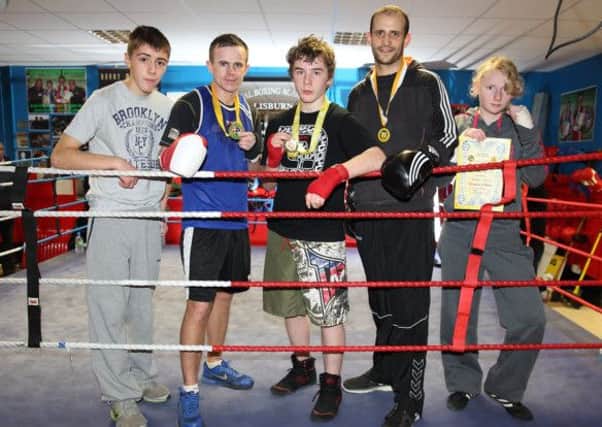 Canal Boxing Academy members James Given, Sean Montgomery, Paddy Doran, Jack Moore and Chloe Fleck were among the medal winners at the recent County Antrim intermediate boxing championships. US1346-540cd Picture: Cliff Donaldson