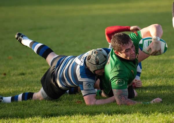 Stephen Ferguson dives over to score a try for City of Derry during Saturday's match against Old Crescent. INLS4813-147KM
