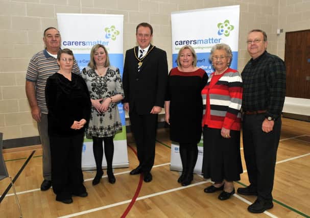 At the information and carers rights day hosted by Carers Matter in the Brownlow Community Hub are, Deputy Mayor of Craigavon, Cllr Colin McCusker, Donna Stewart, chair of Carers Matter, Patricia Jordan, manager and carers, Bernie Scullion, Desmond Moore, Mary Martin and Don Nelson. INLM49-102gc