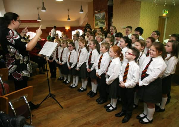 The Ballykeel PS choir who sang for Radio Cracker at Montgomerys last week. INBT49-204AC