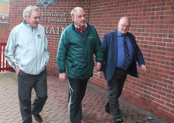 Adrian Eakin, (centre) a second cousin of the late Katheryn Eakin who was killed in the Claudy bombng in 1972 arrives at Coleraine Police to report the crime over again as the the investigation was stopped by The PSNI. With Mr Eakin is TUV Member Willie Blair (right) and David Nicholl of Ulster News.PICTURE MARK JAMIESON.