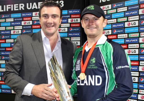 Tim Anderson of ICC with Ireland captain William Porterfield.