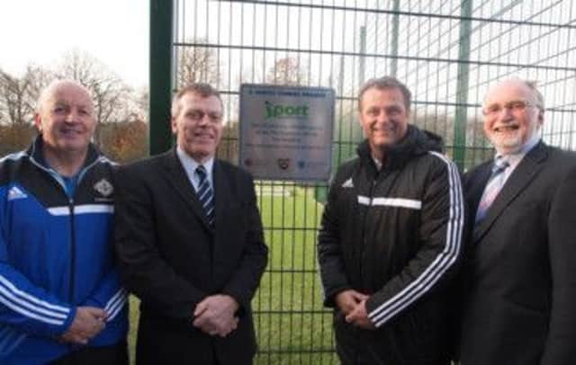 THREE G'S FOR JIM. Irish FA Elite Performance Director, Jim Magilton, who officially opened the 3G pitch at Dalriada School on Friday, pictured along with Dalriada football coach, Ian Getty, Principal Tom Skelton and Chairman of the Board of Governors, Brian Dillon.INBM49-13 026SC.