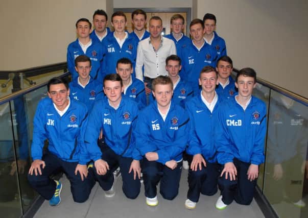 Southside Youths pictured with Ritchie Remo who put on a sell out show for the club in the Braid.