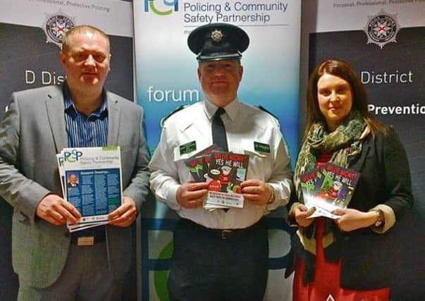 Pictured at the launch of the Lisburn PCSP Christmas Safety Campaign are the Chairman of the Lisburn PCSP, Councillor Stephen Magennis, Inspector Derek McCamley and Sonya Nelson, SERC Students' Union.